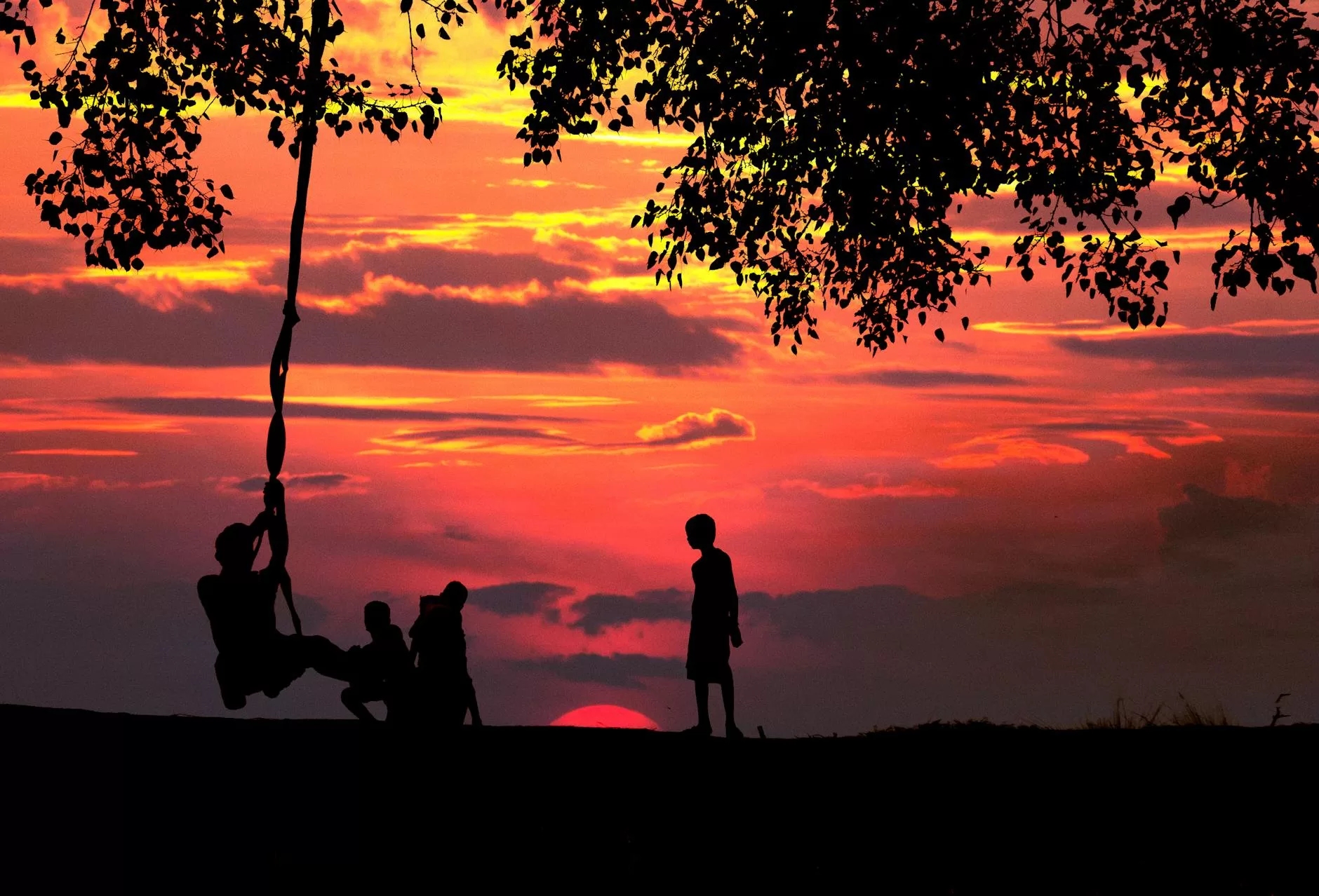 silhouette photo of children playing